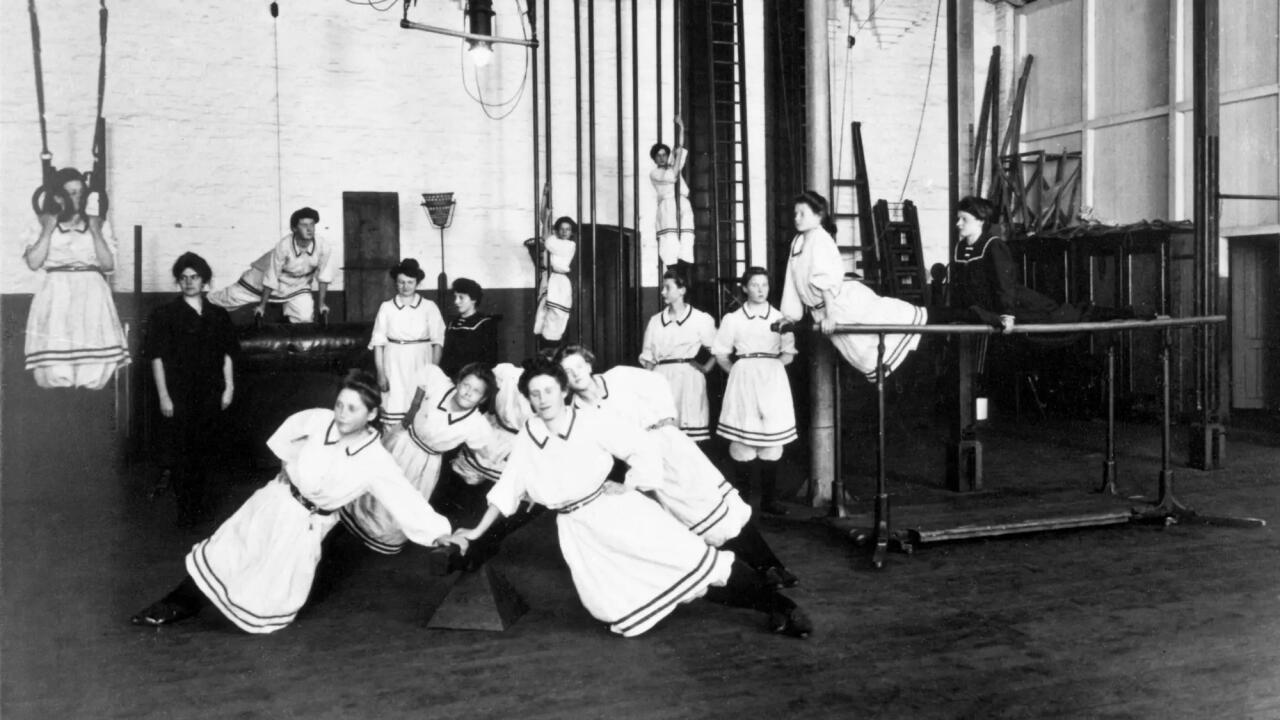 Female employees doing gymnastics