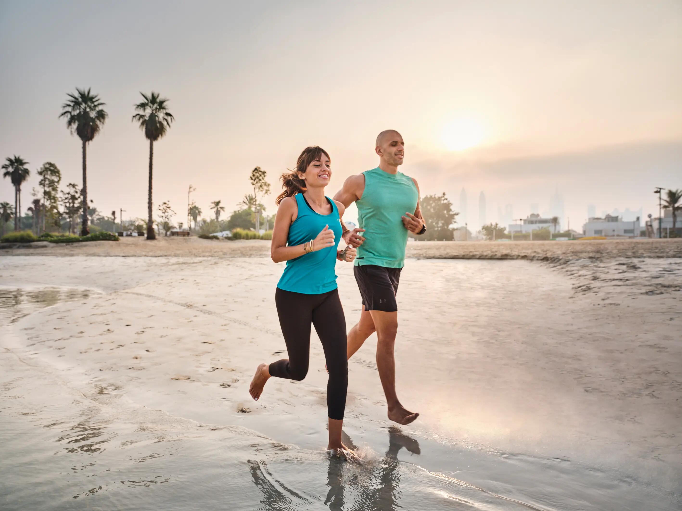 colleagues-jogging-on-the-beach.jpg