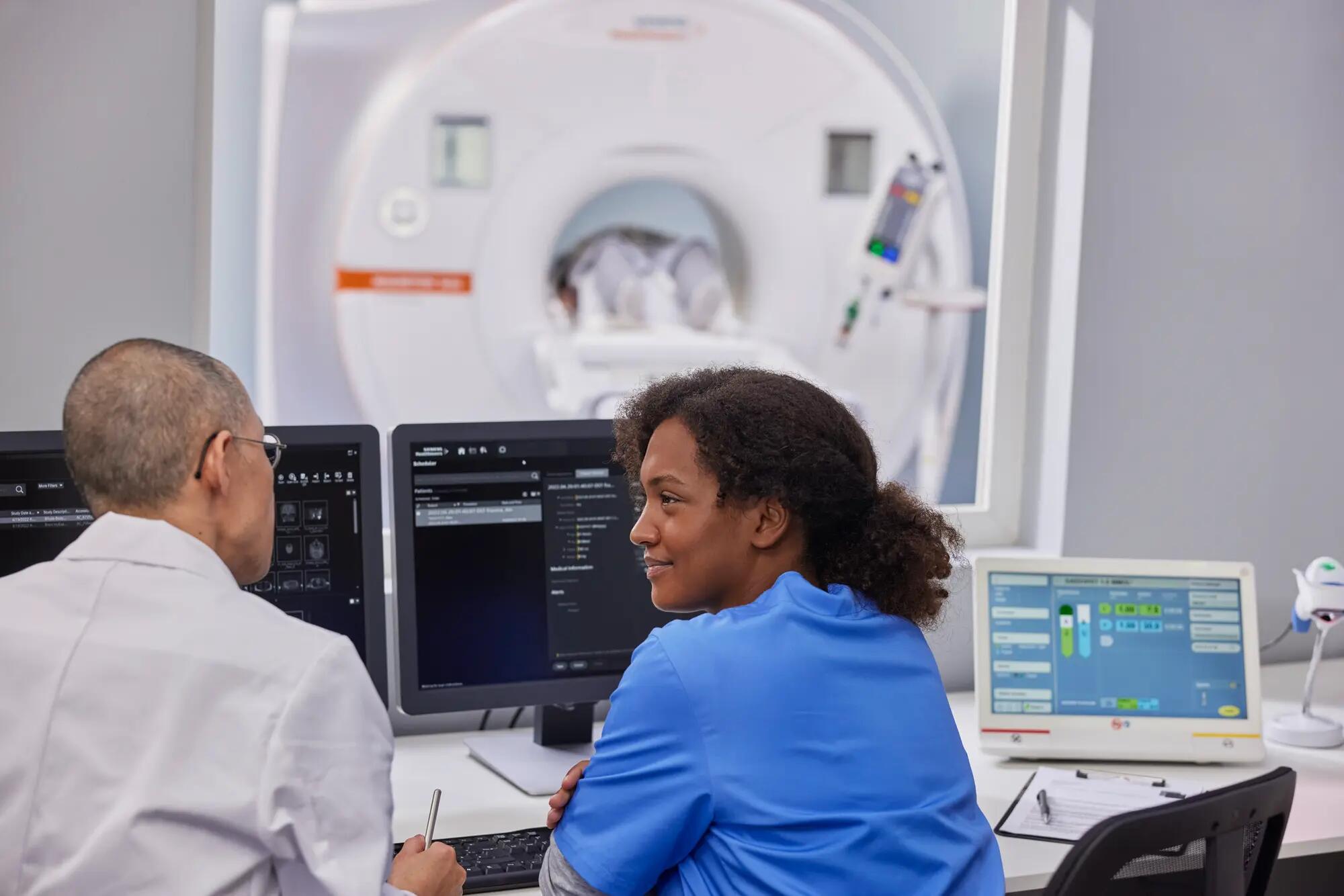 Radiology team looking at scans.